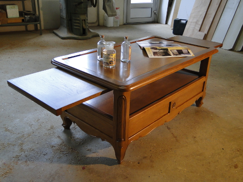 table basse sculpte en bois de chene massif avec rallonge